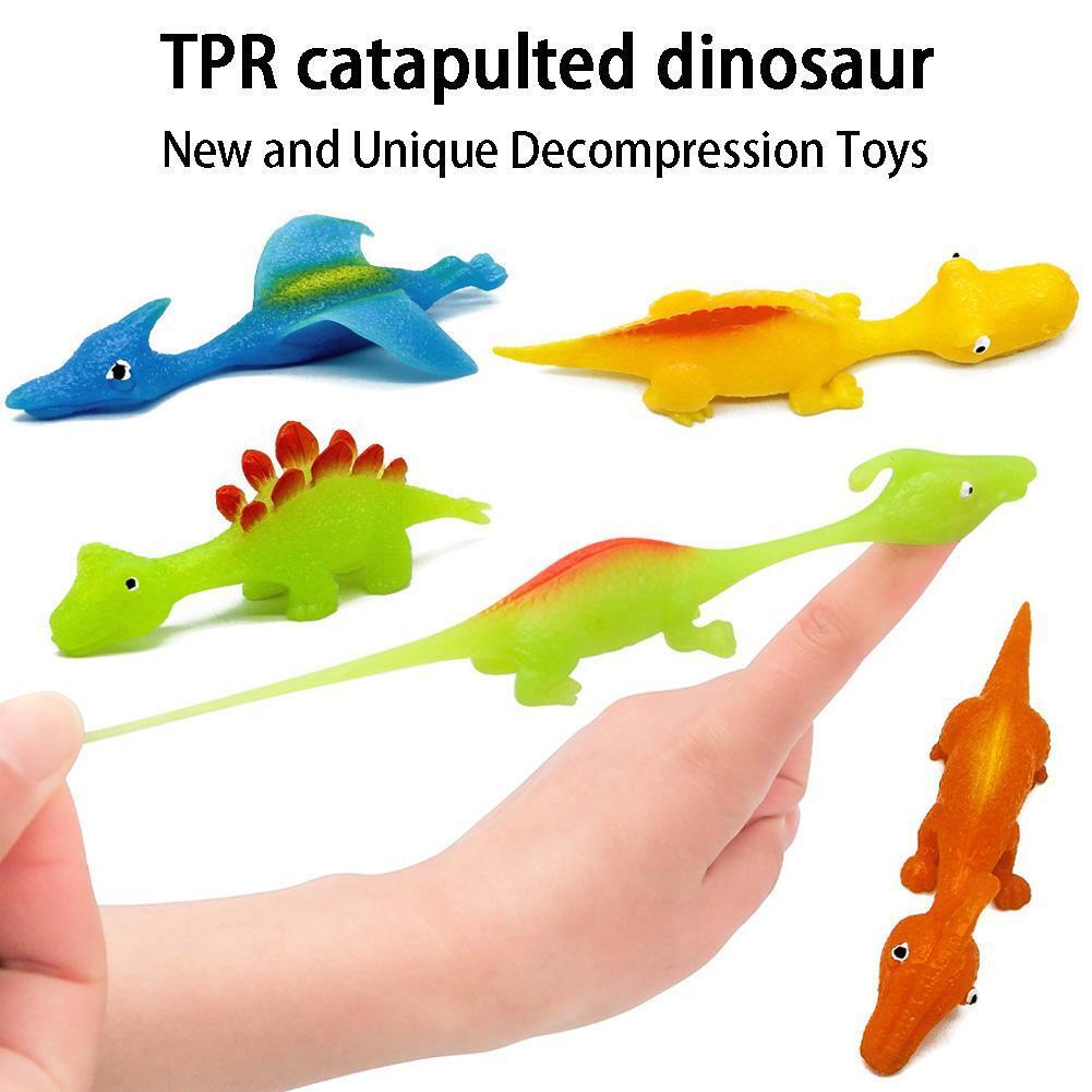 Slingshot Dino-Launch Finger Fun Toys by Geo’s Online Store